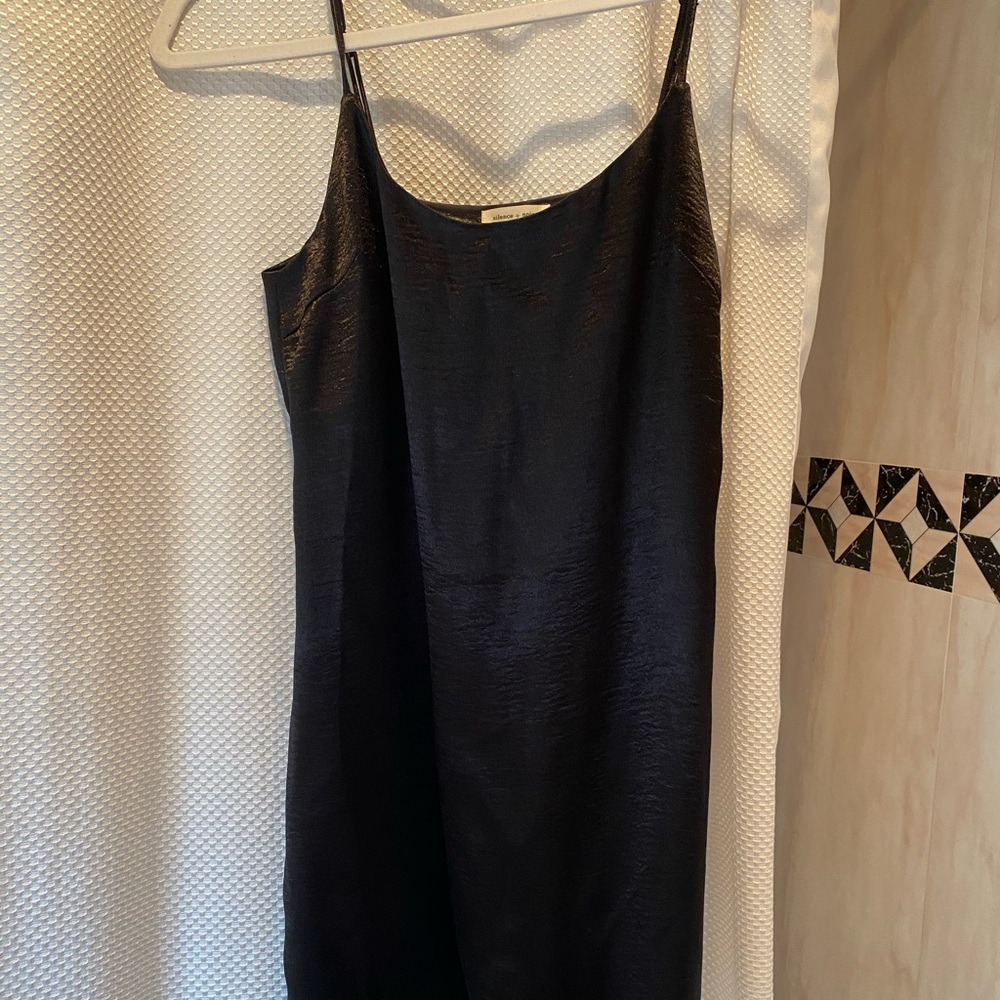 Black mini stress with adjustable spaghetti straps